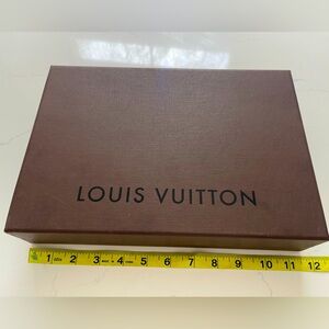 Large brown Louis Vuitton box. Minor scratches measuring 11 1/2 x 8